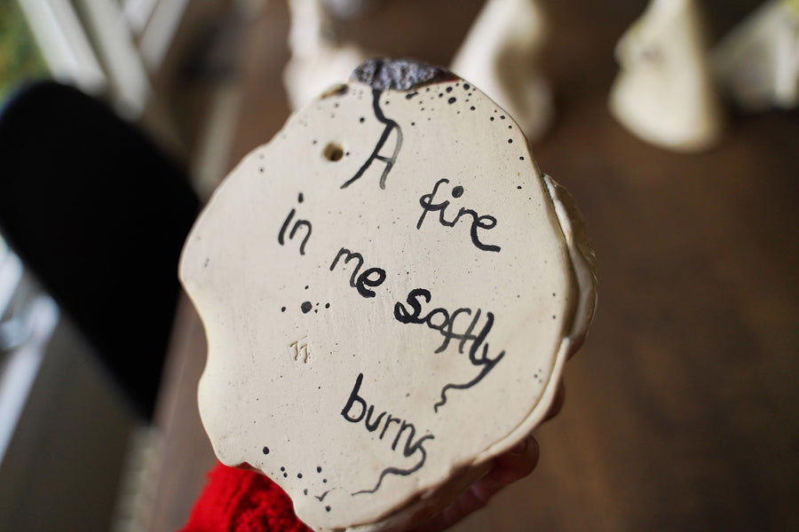 A fire in me softly burns